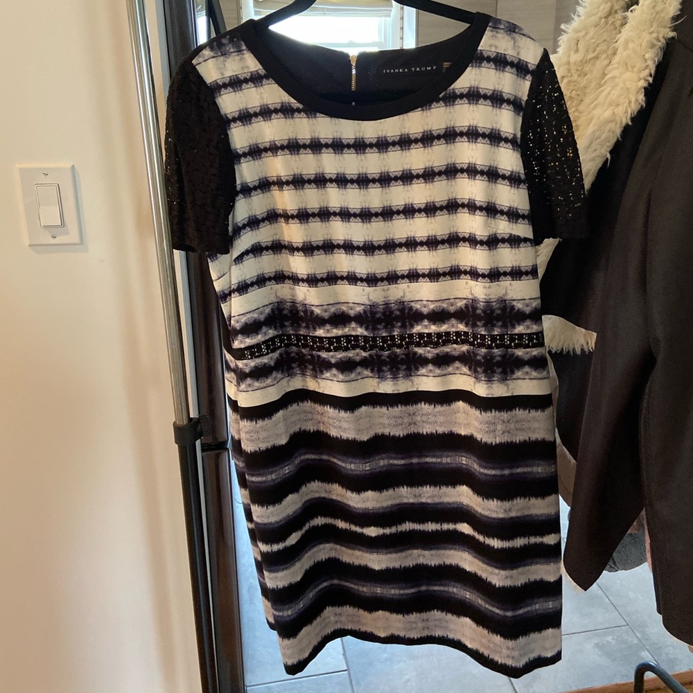 Beautiful blue and white tie-dye dress with black lace trim and exposed zipper